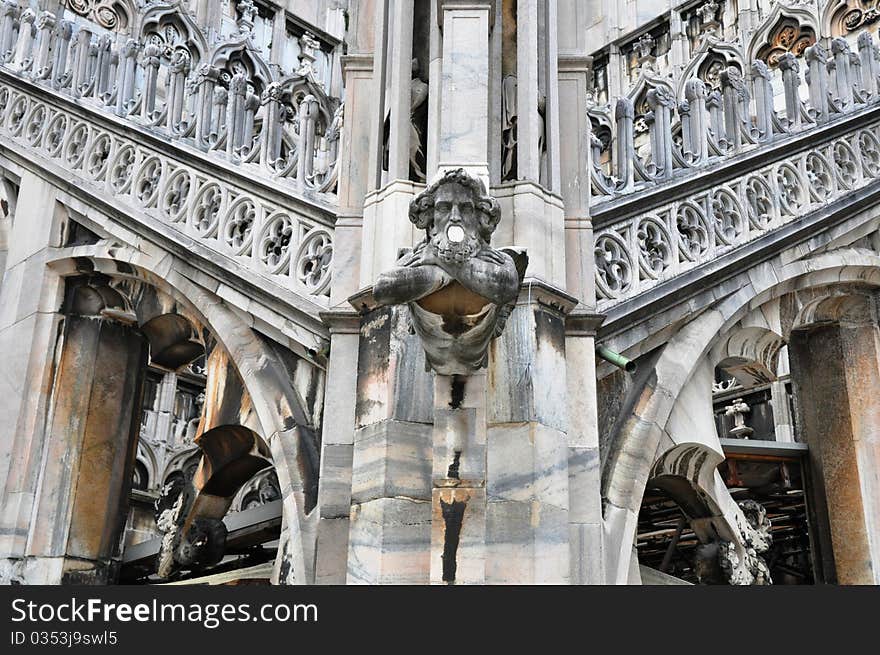 Gothic church architecture with gargoyle in Italy