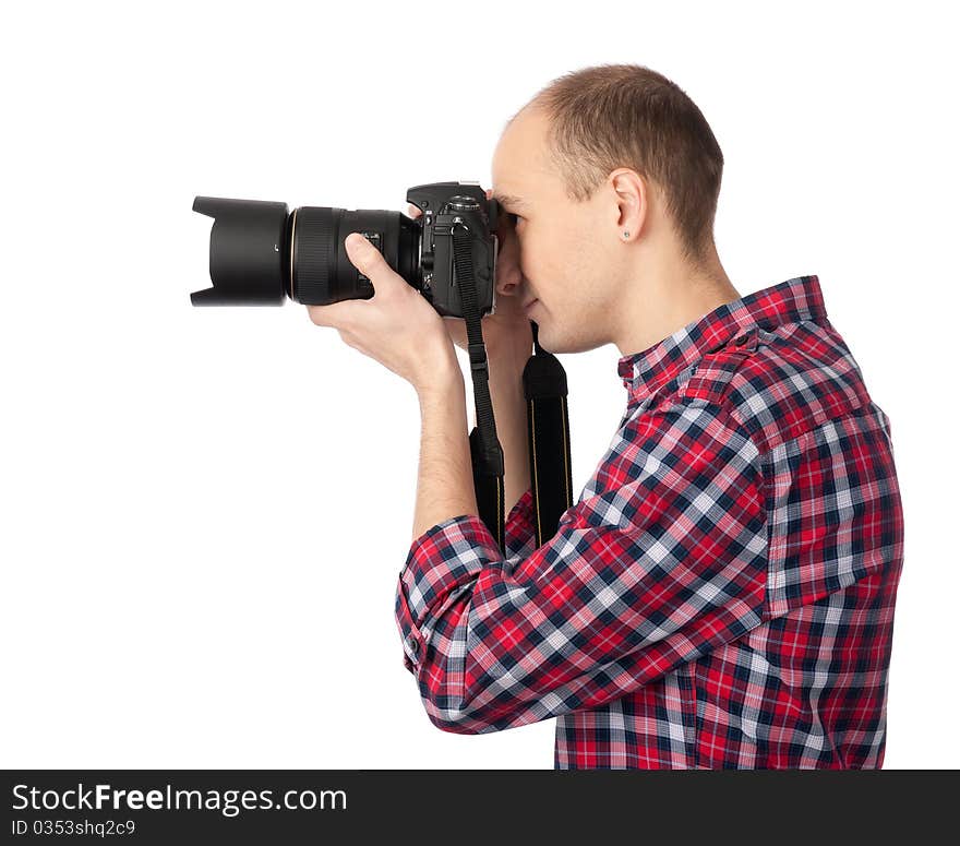 Young photographer with camera, isolated on white