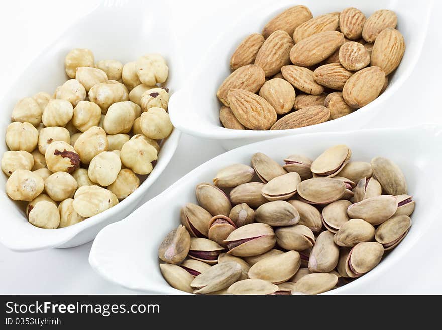 Various nuts; hazelnuts and almond and pistachio