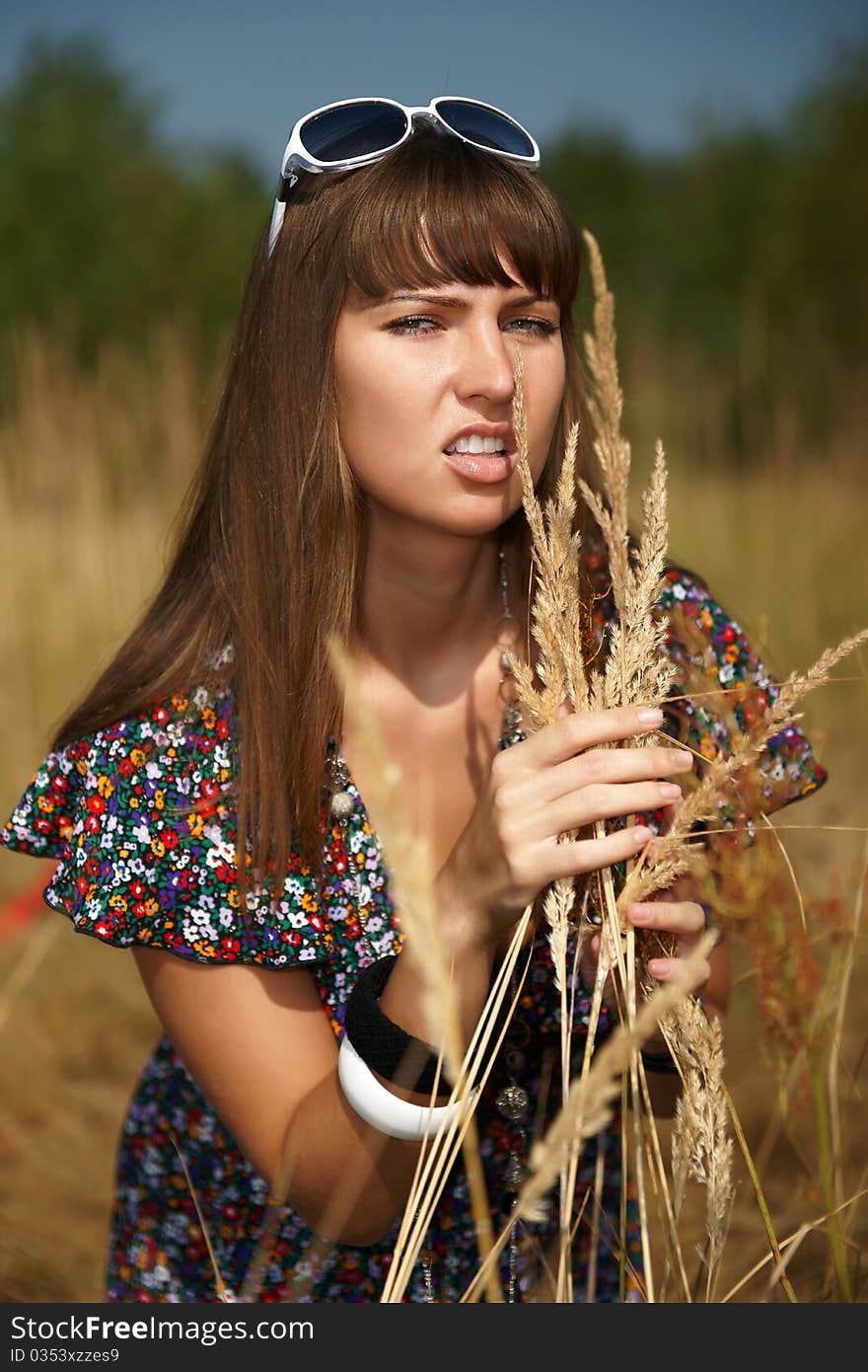 The beautiful girl in the field