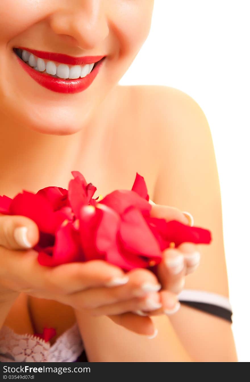 Beautiful caucasian woman with red roses isolated