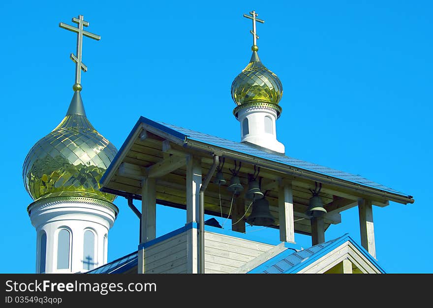 Domes of orthodox church against the dark blue sky