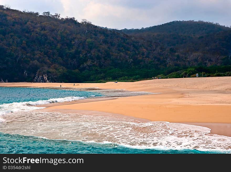 Unidentified Campers having fun on a hidden beach. Unidentified Campers having fun on a hidden beach.