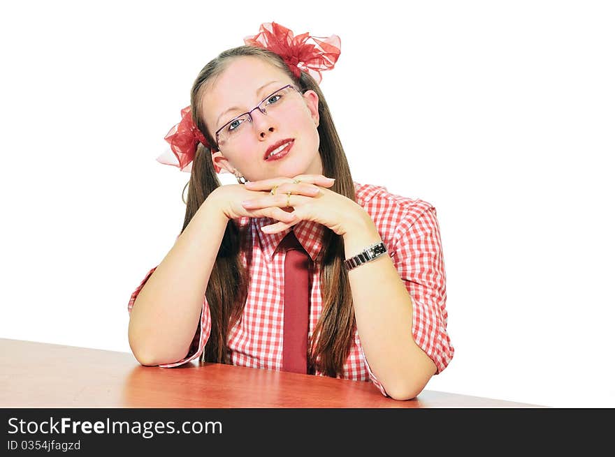 Girl in glasses with a red bow in a plaid blouse turned my head. Girl in glasses with a red bow in a plaid blouse turned my head