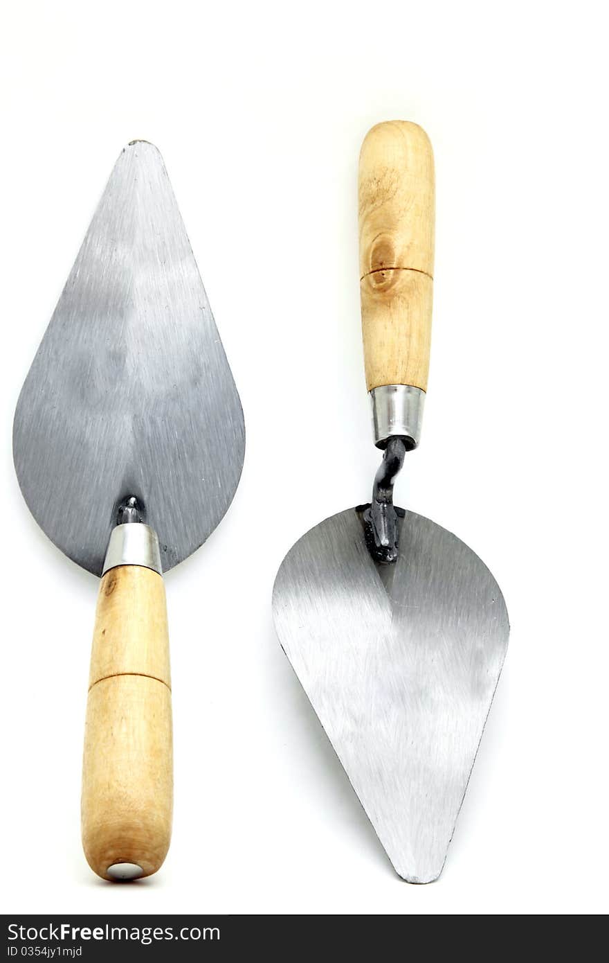 Set of construction lute trowels, vertical