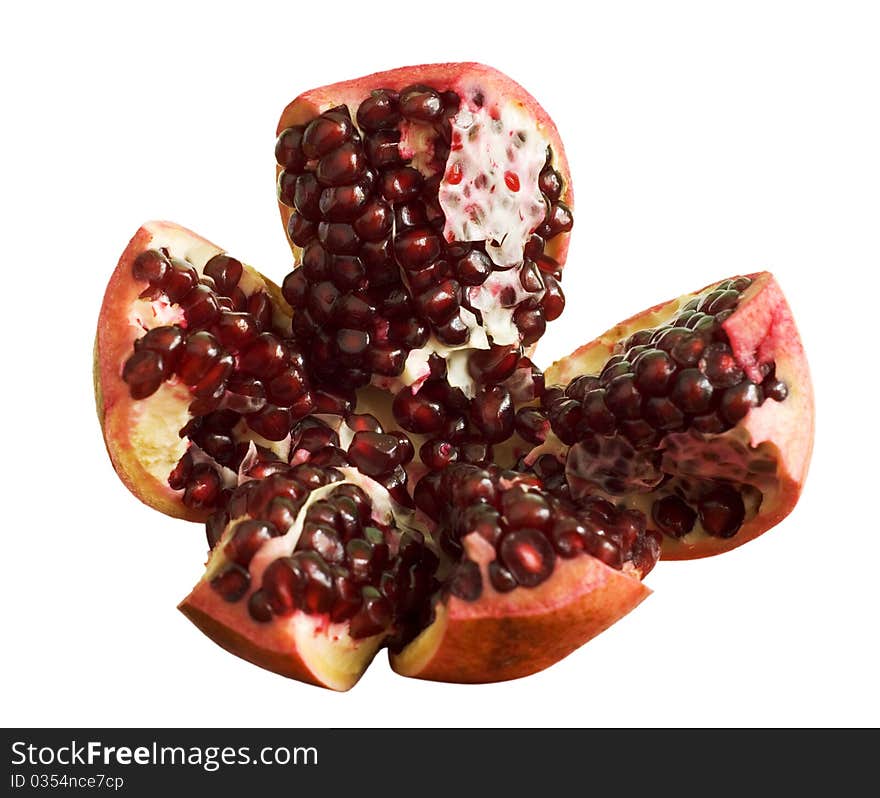 Fruit, sliced pomegranate, isolated on a white background