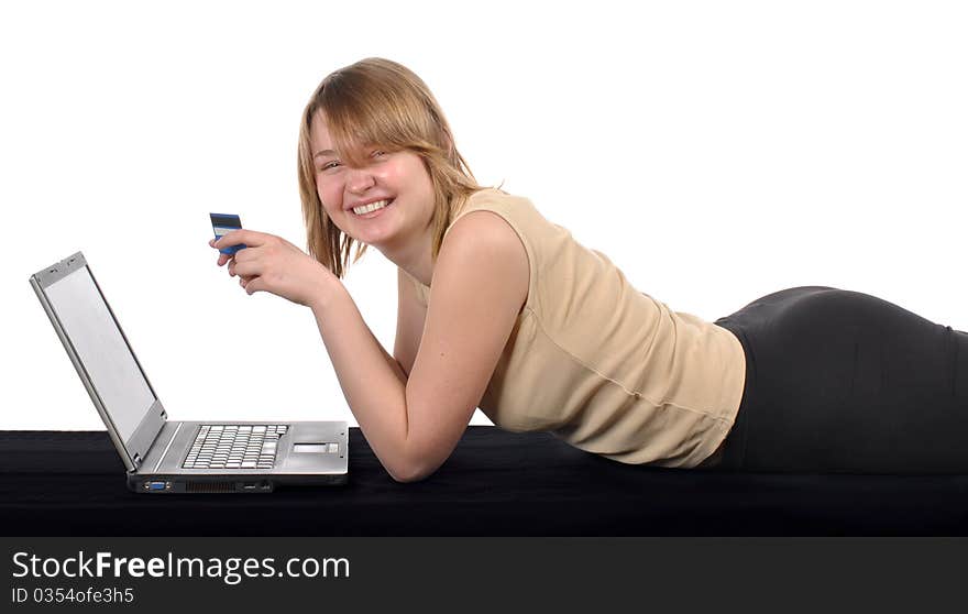 Young blond with laptop. Studio shot against white background. Young blond with laptop. Studio shot against white background