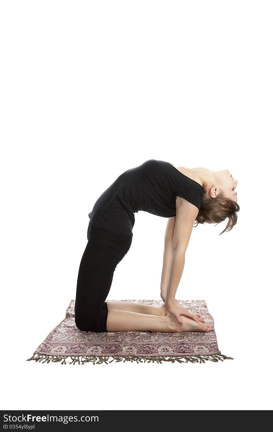 Young woman practicing Yoga exercises. Young woman practicing Yoga exercises.