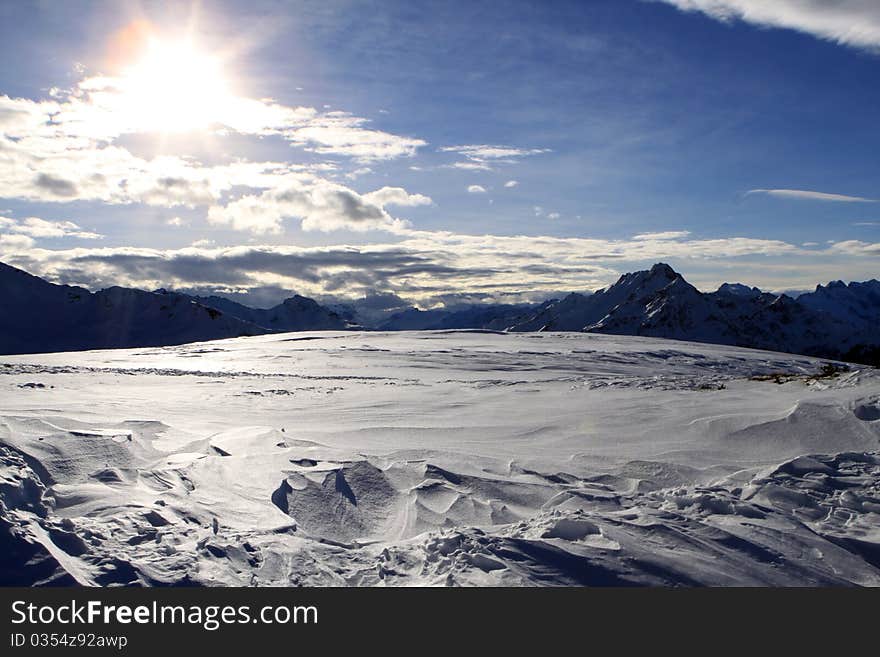 View from the top of the Skiing Region Arlberg to the European Alps in Austria