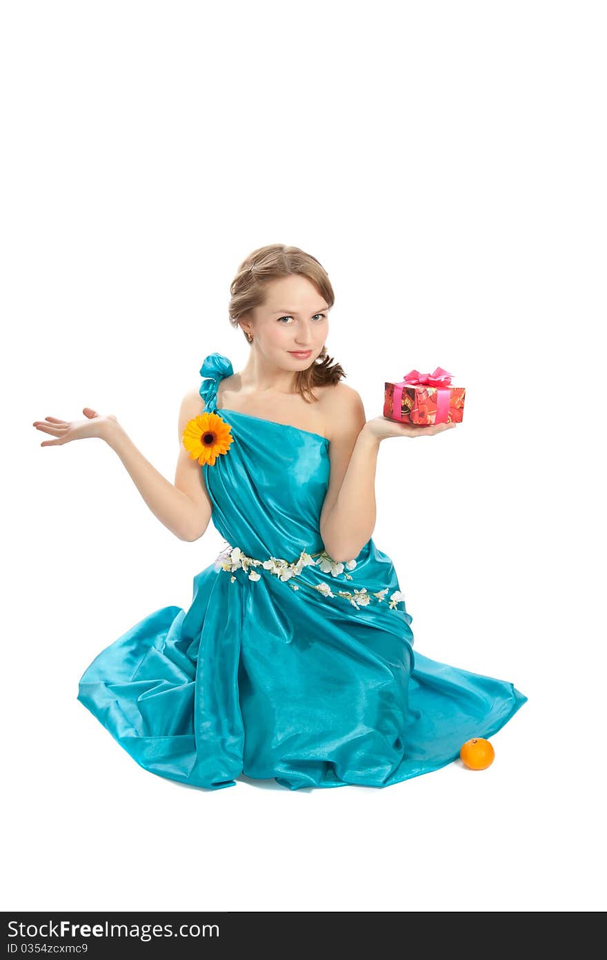 Young beautiful woman with flower and gift.