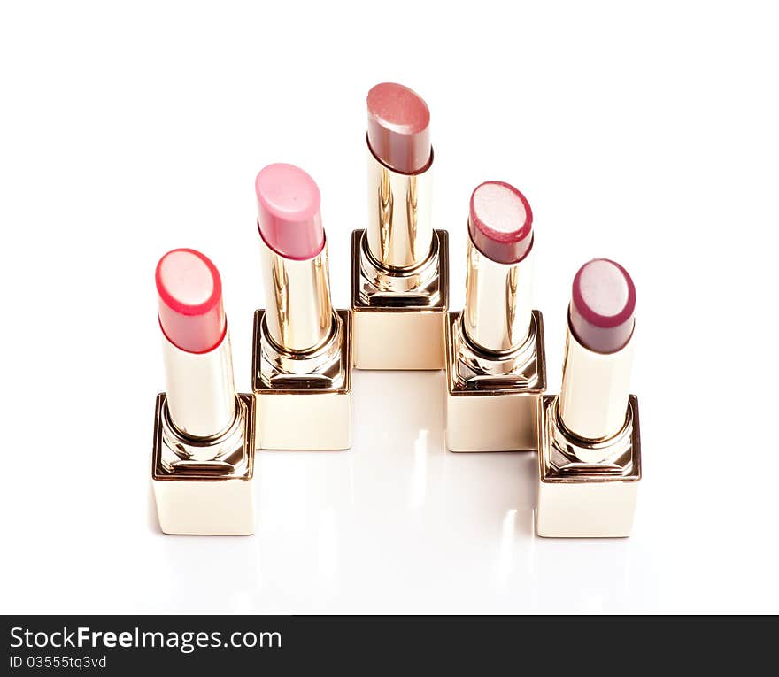 Group of lipsticks on a white background