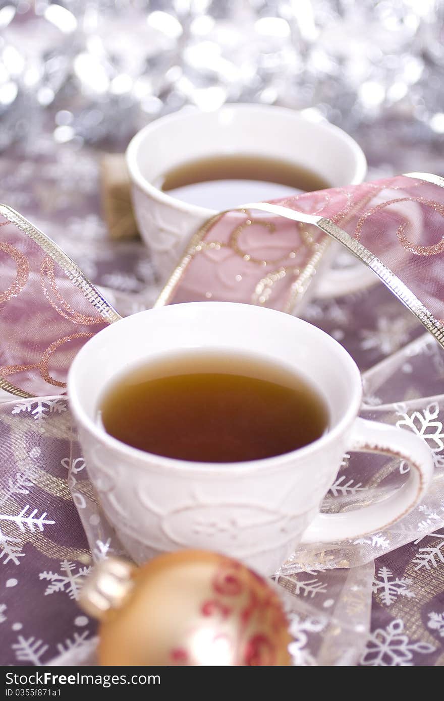 Winter tea on silver background