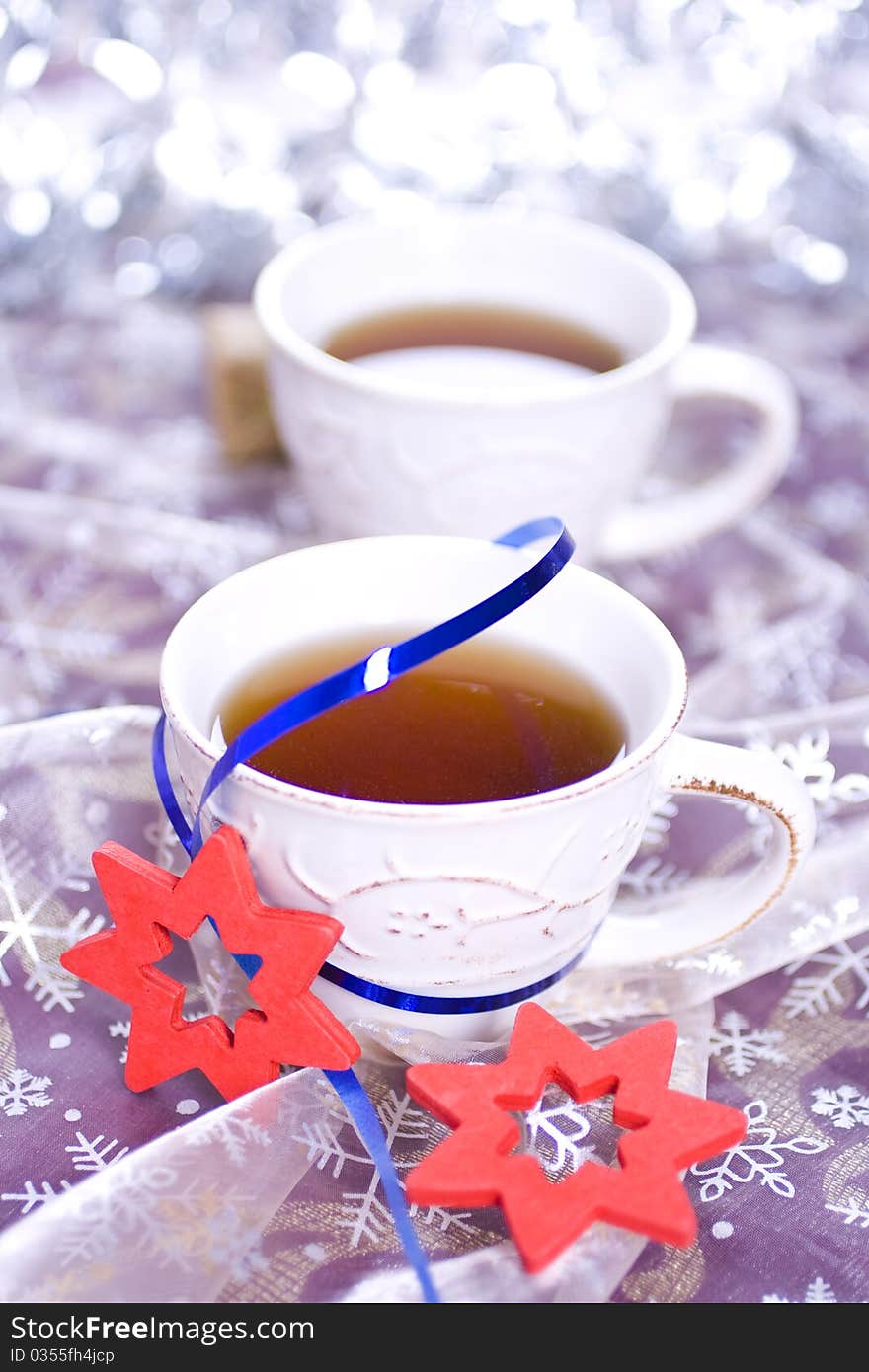 Winter tea on silver background