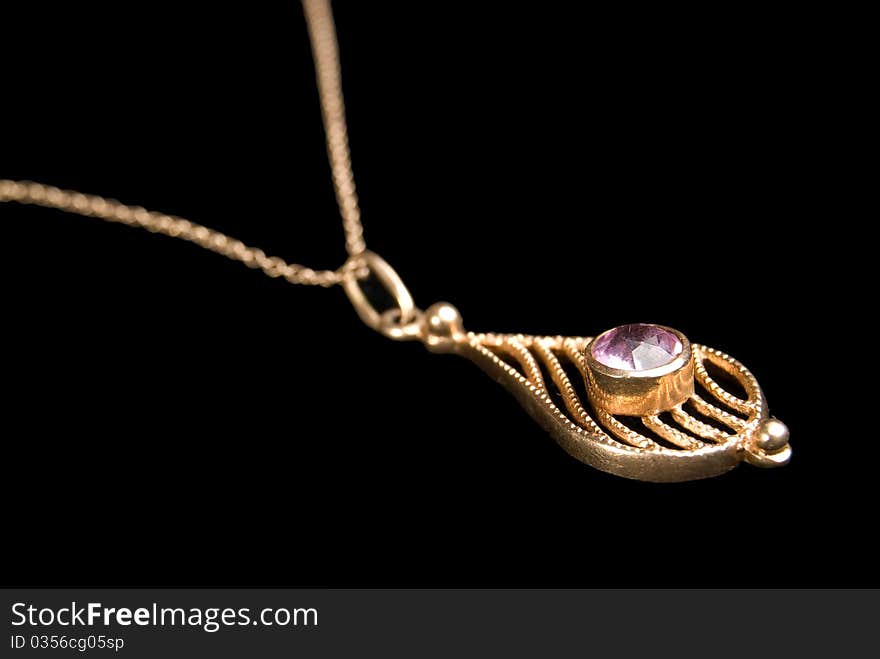 Gold Coulomb With Amethyst