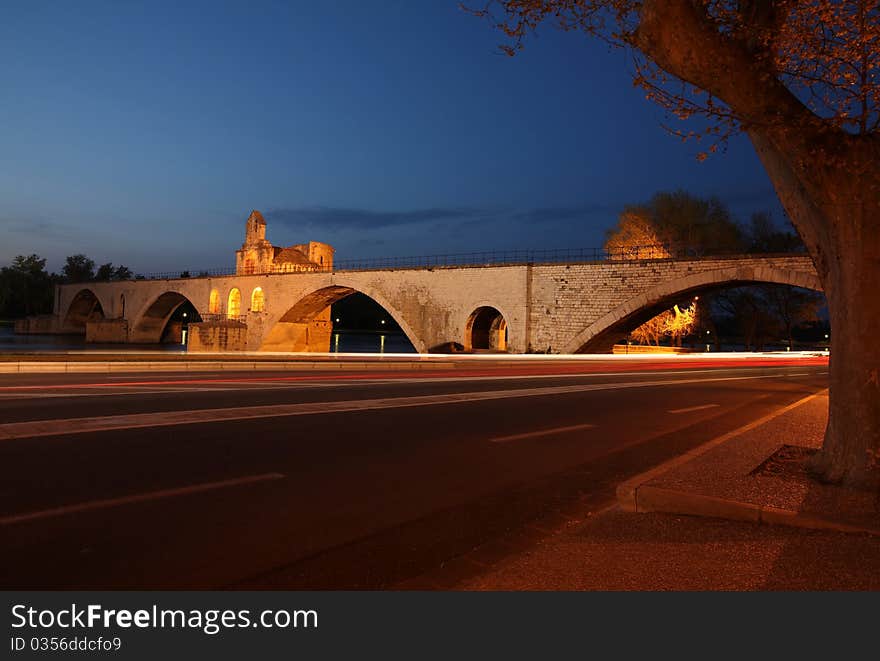 Night view of the Pont St. Benezet (AKA Pont d'Avignon) famous bridge in the town of Avignon, France