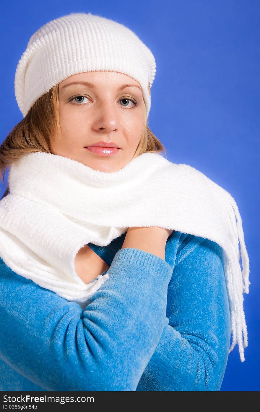 Young  woman on a blue background