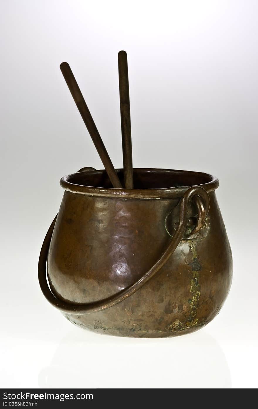 Copper pot with chopsticks