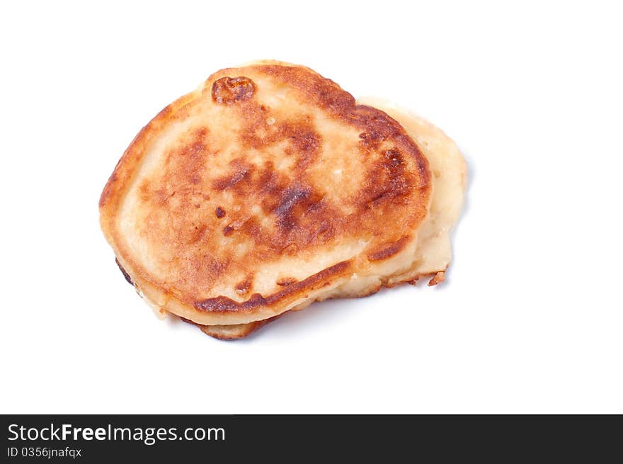 Cooking pancakes on a white background.