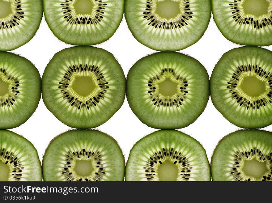 Twelve segments of a kiwi fruit