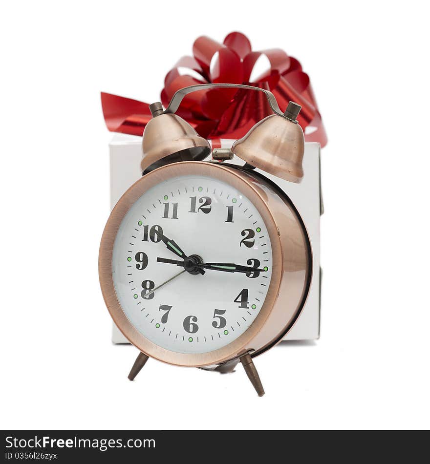 A retro clock with presents isolated on white bacground