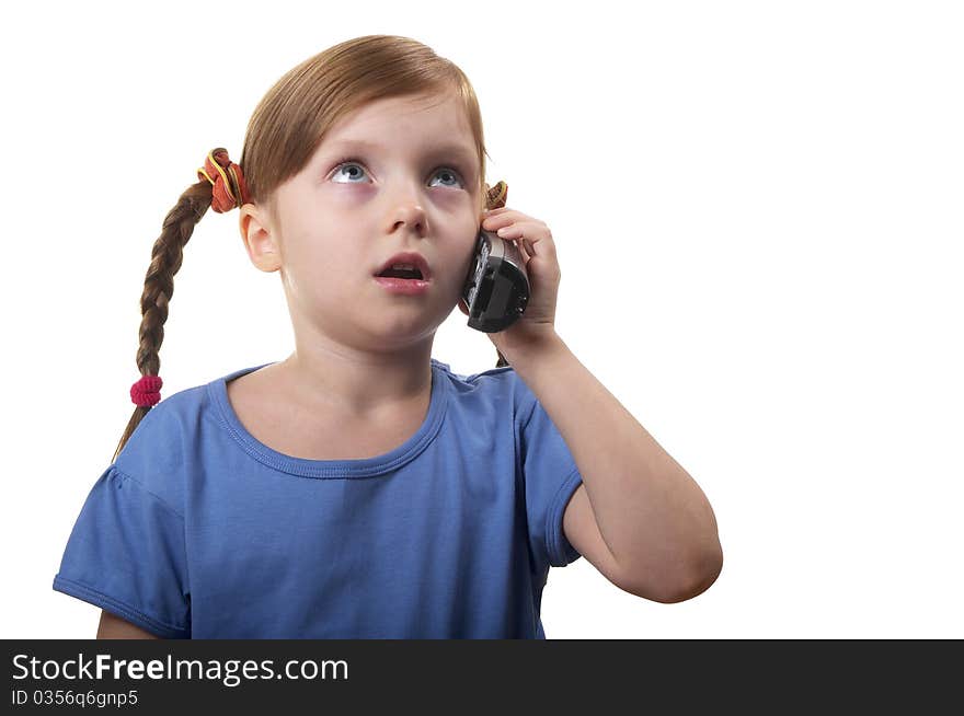 Funny smiling little girl takling by phone portrait isolated over white background. Funny smiling little girl takling by phone portrait isolated over white background