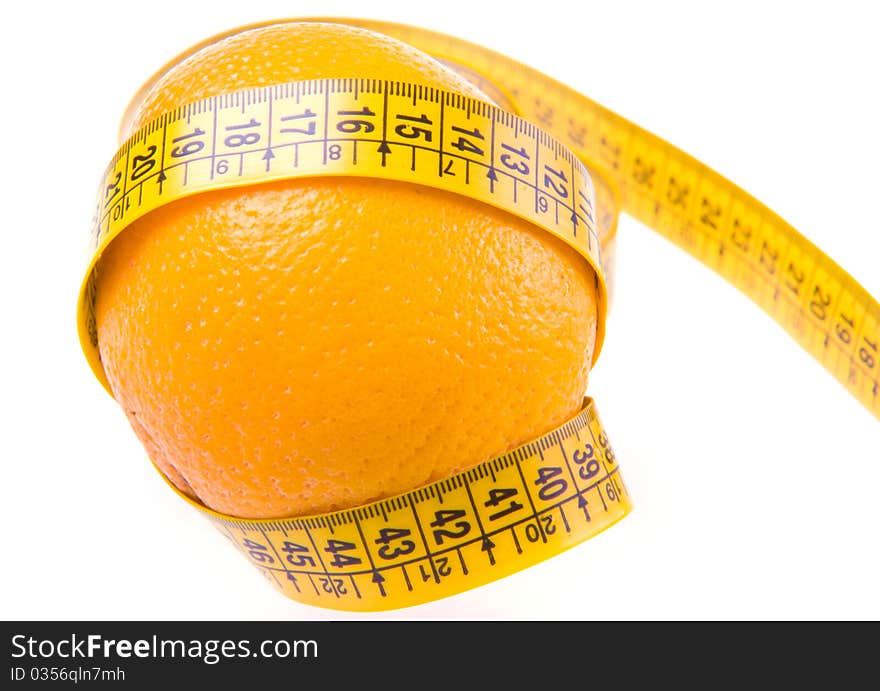 Orange and ruler. Healthy lifestyle. Weight loss. Vitamins. Fruit. Orange and ruler. Healthy lifestyle. Weight loss. Vitamins. Fruit