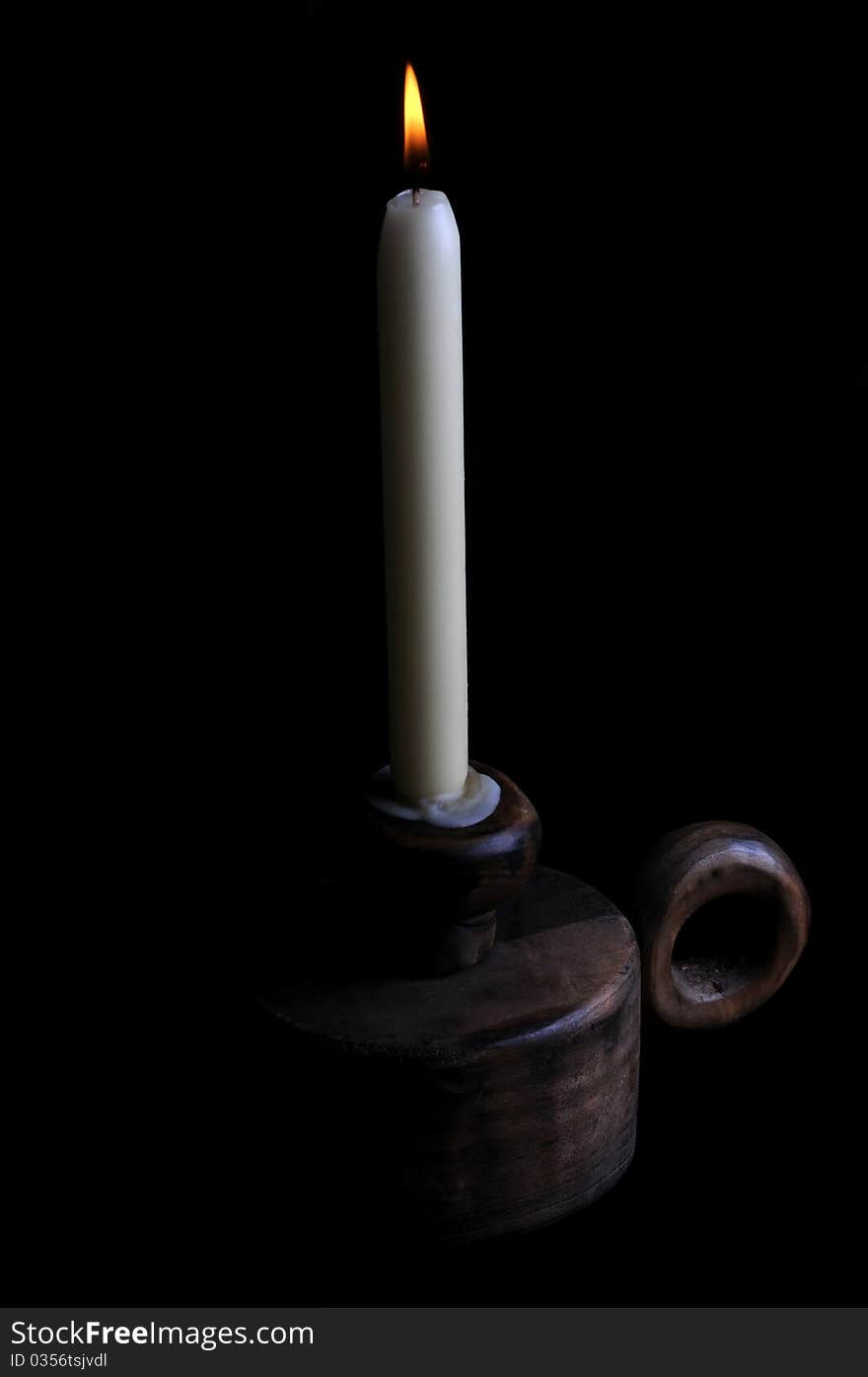 Single candle on black background. Single candle on black background