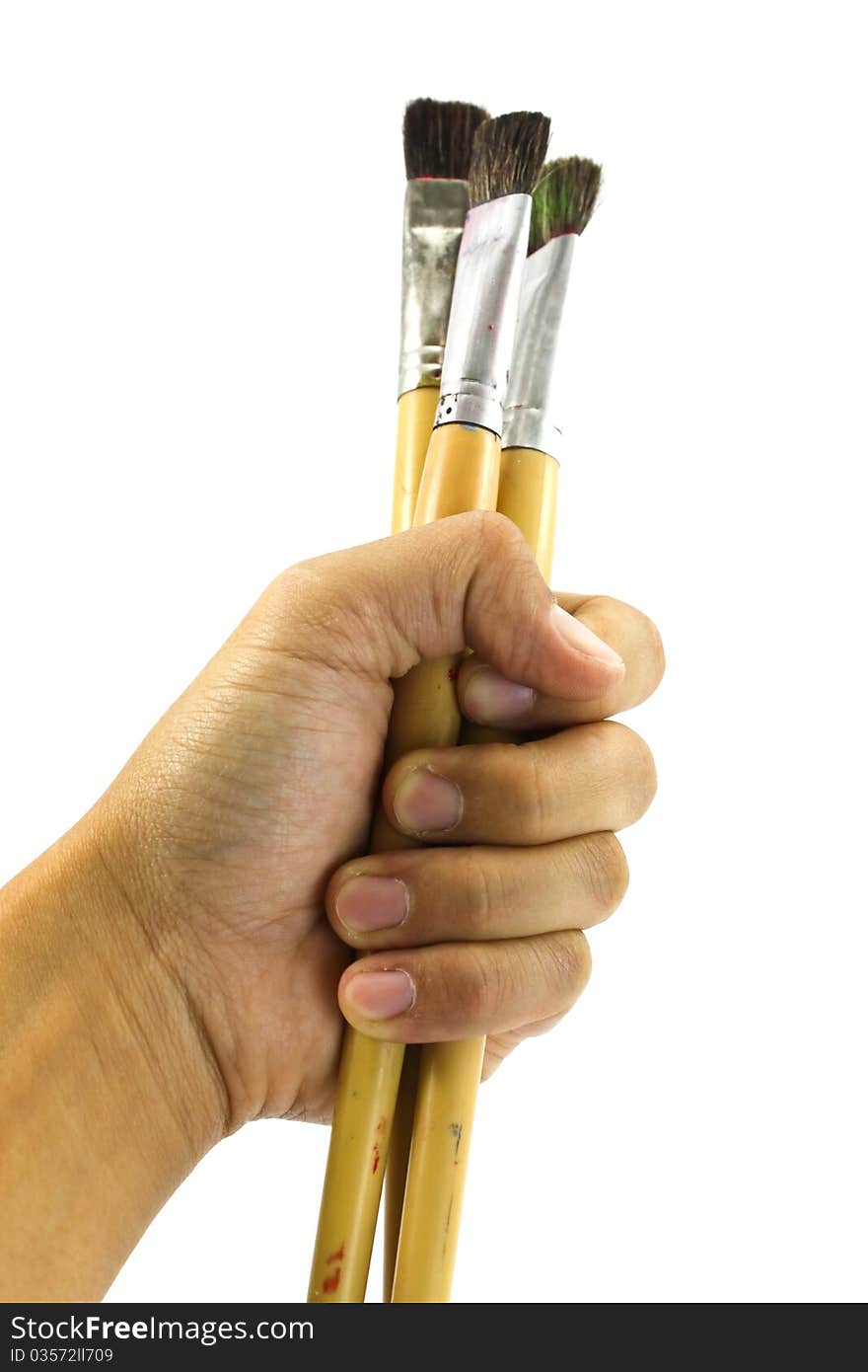 Hand with brush stained isolated on white background. Hand with brush stained isolated on white background