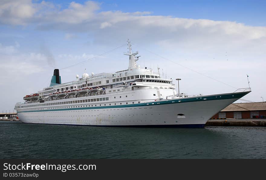 Starboard side of a cruise tied up in Alicante