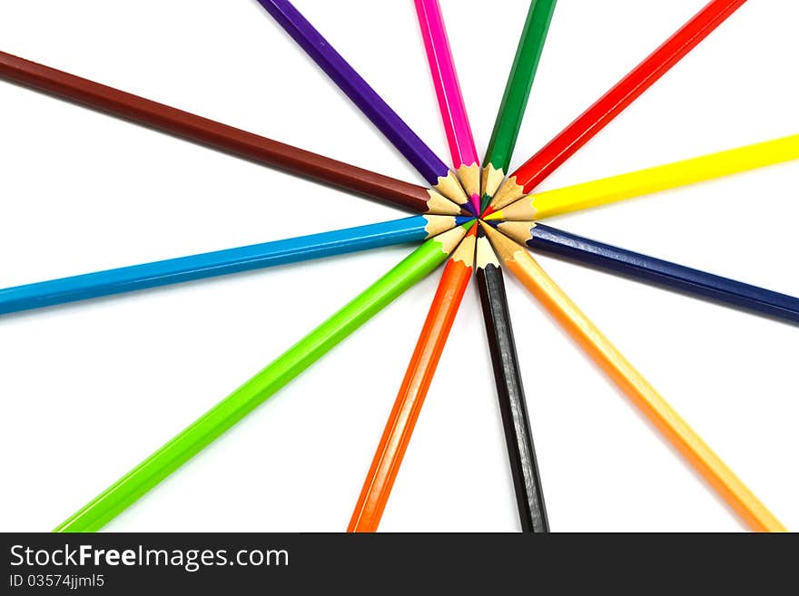 Assortment of coloured pencils on white background. Assortment of coloured pencils on white background