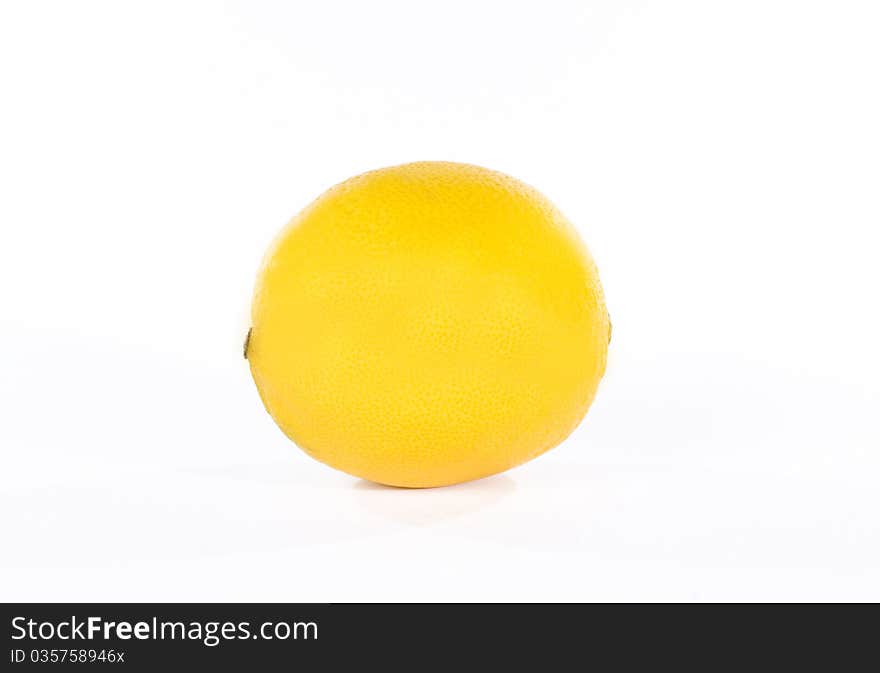 Yellow lemon over white background. Studio shot.