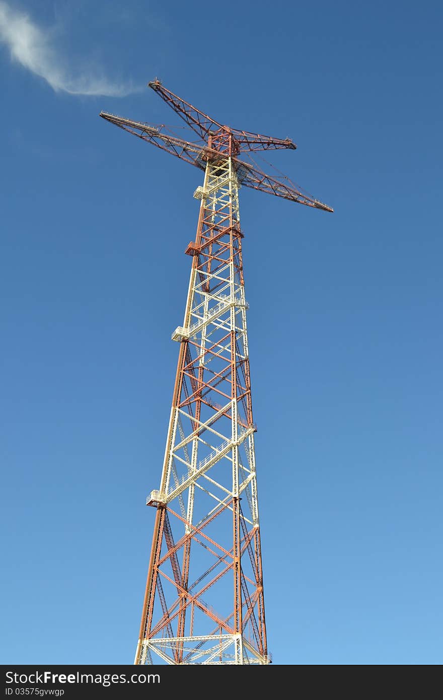 Electricity pylon on blue sky, located in Calabria,Italy.