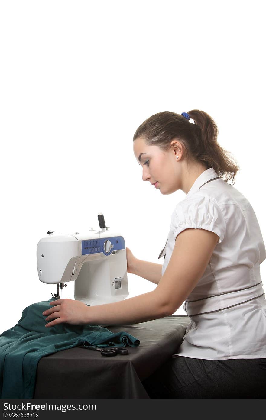 Woman seamstress work on the sewing-machine