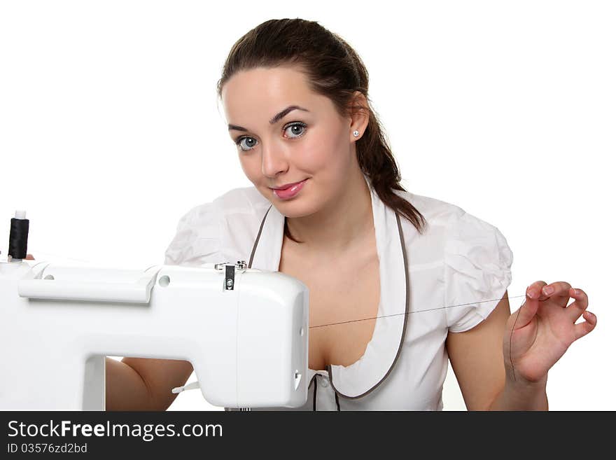 Woman seamstress work on the sewing-machine