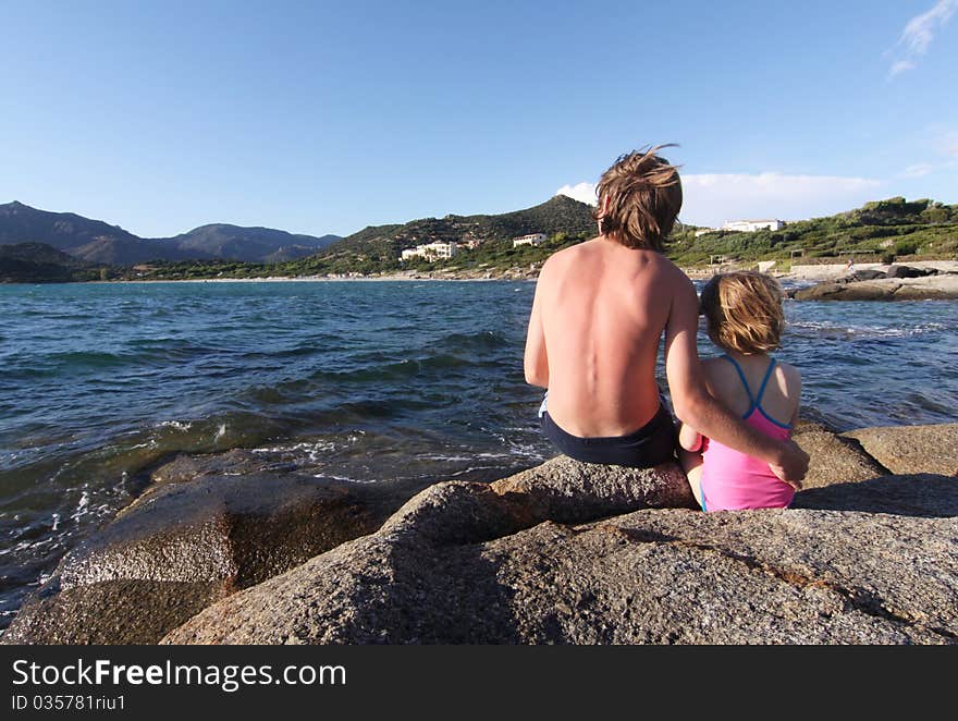 Brother and sister on seashore, Sardinia. Brother and sister on seashore, Sardinia