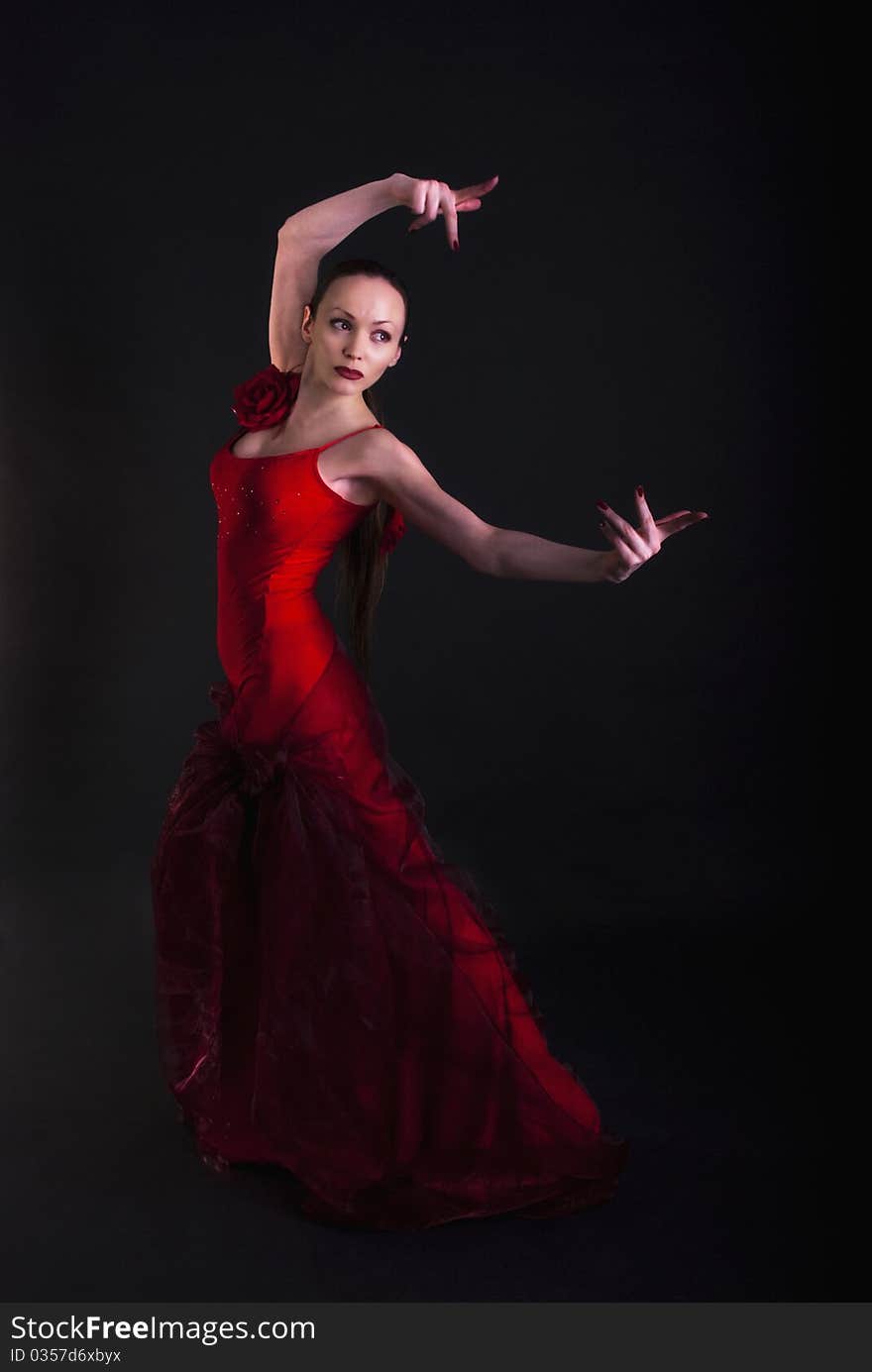 Image of a flamenco woman dancer with red veil. Image of a flamenco woman dancer with red veil