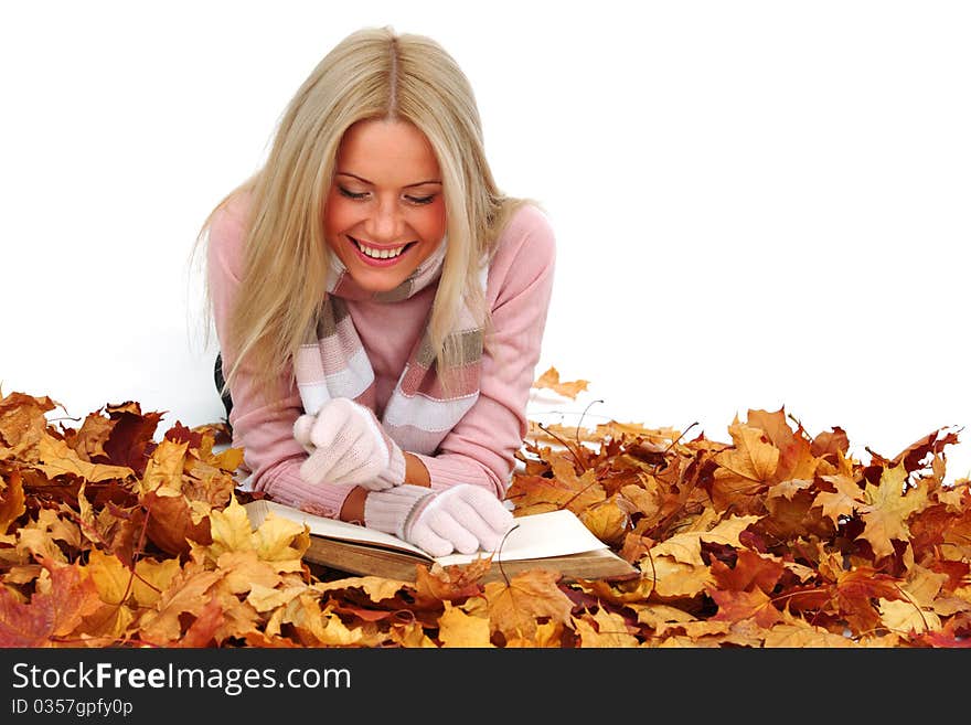 Autumn woman read in studio on leaves