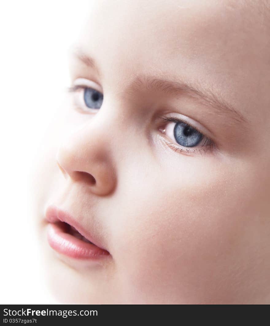 Little cute girl's face close up on a white background. Little cute girl's face close up on a white background