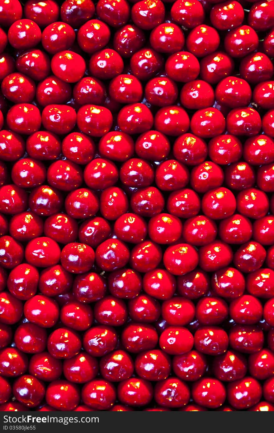 Fresh cherries are stapled in pattern at the market