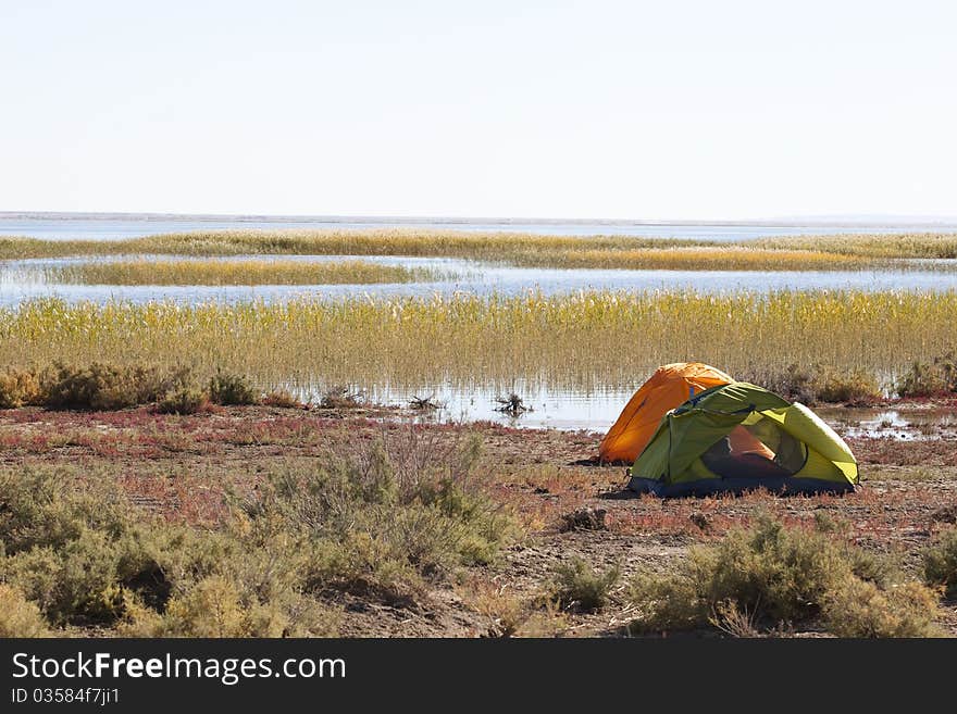 Campsite with Tent at the lake.