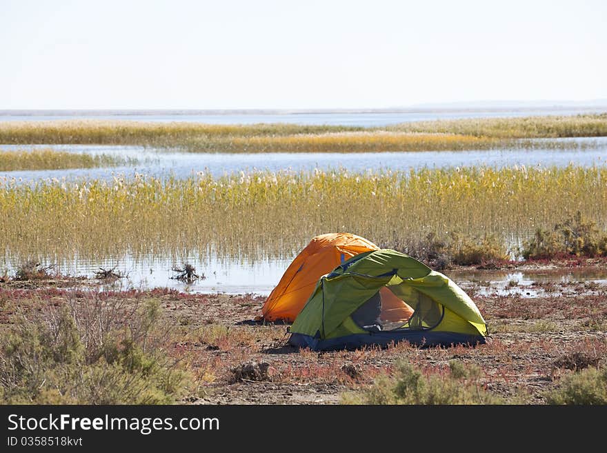 Campsite with Tent at the lake.