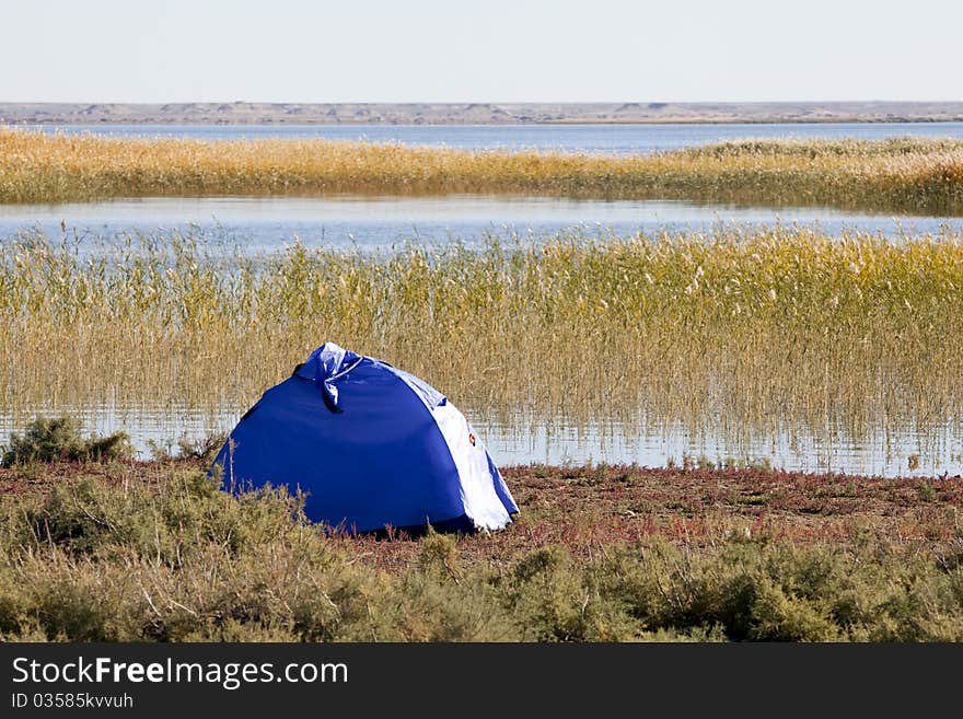 Campsite with Tent  at the lake.