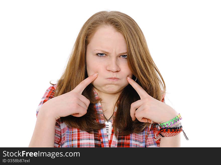 Ridiculous girl inflates cheeks on the isolated background