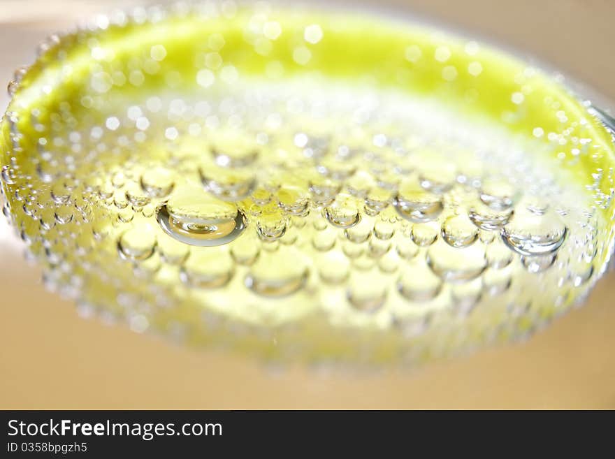 Lemon and drops of carbonated water