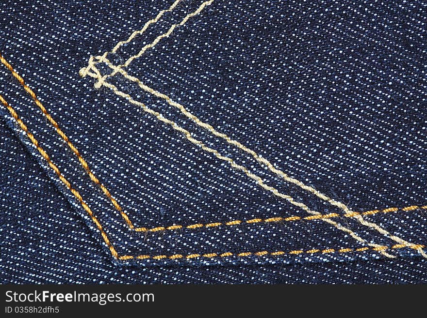 Showing lines and texture of blue jeans, back pocket. Showing lines and texture of blue jeans, back pocket.