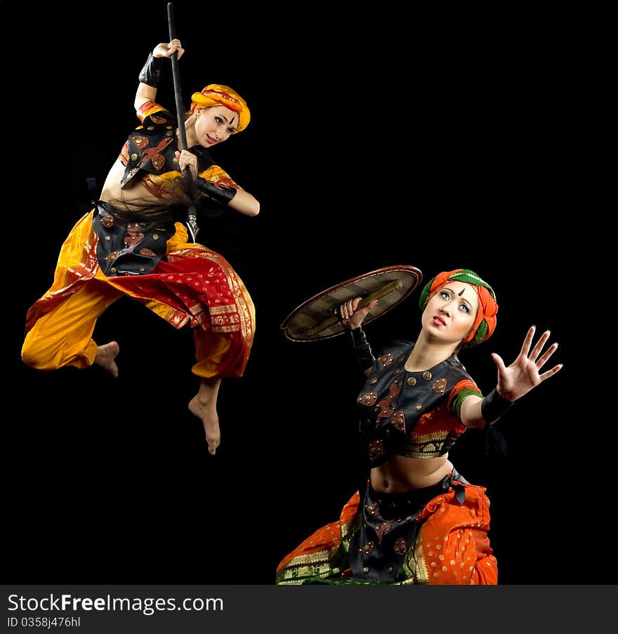 Two woman fight with spear and shield