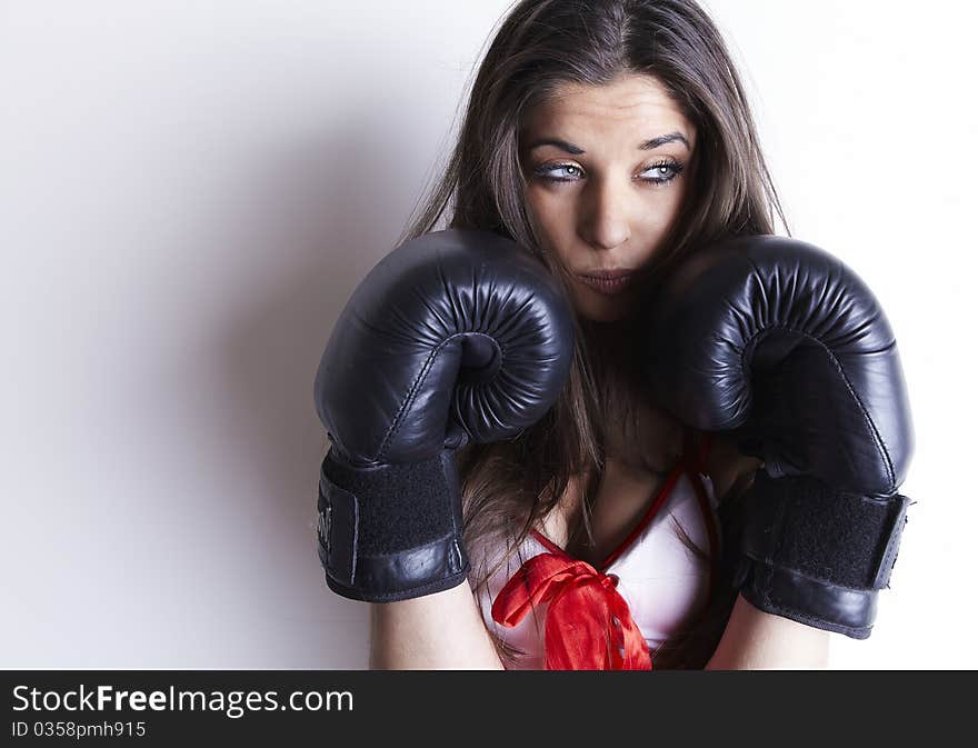 Boxing woman in sexy dress