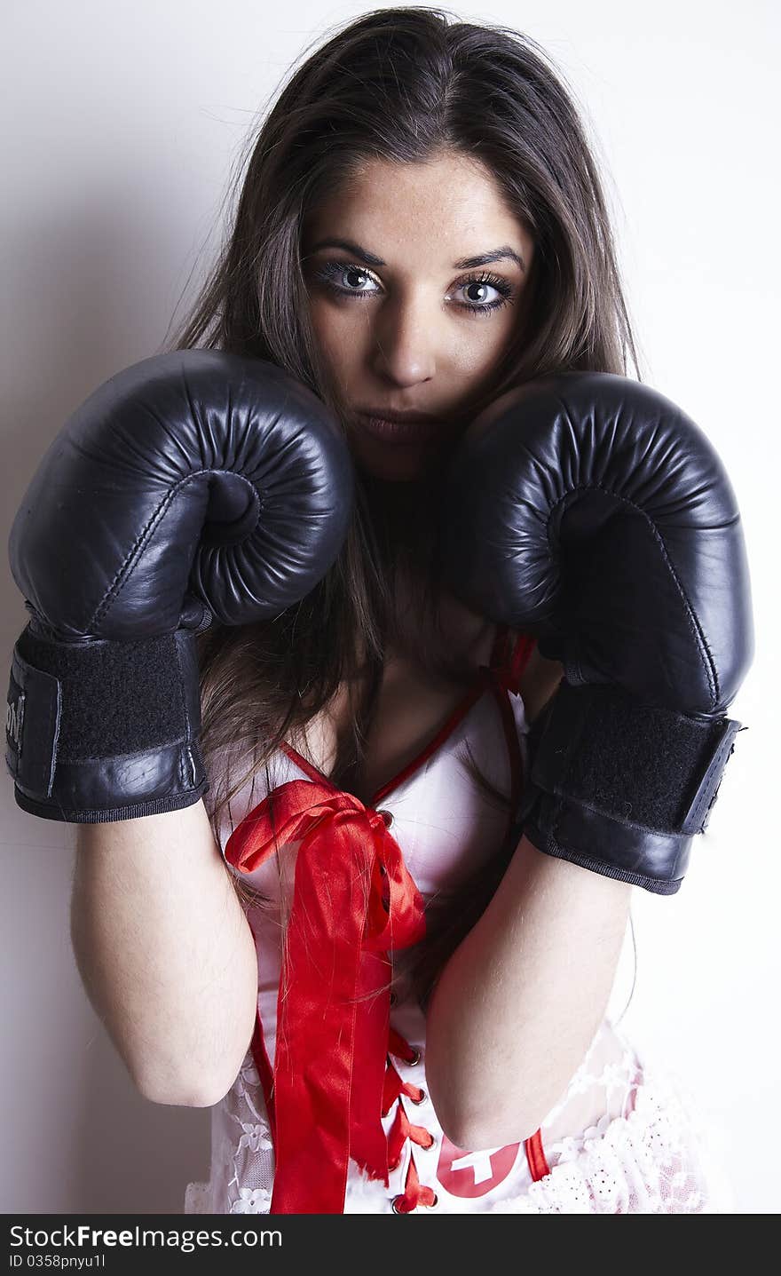 Boxing woman in sexy dress