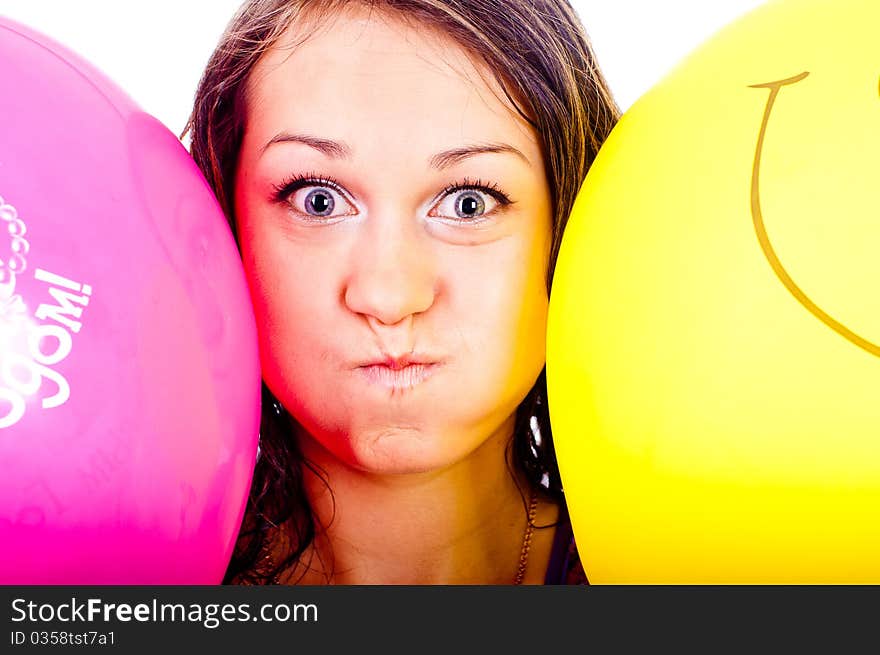 Woman with ballons in studio isolated on white