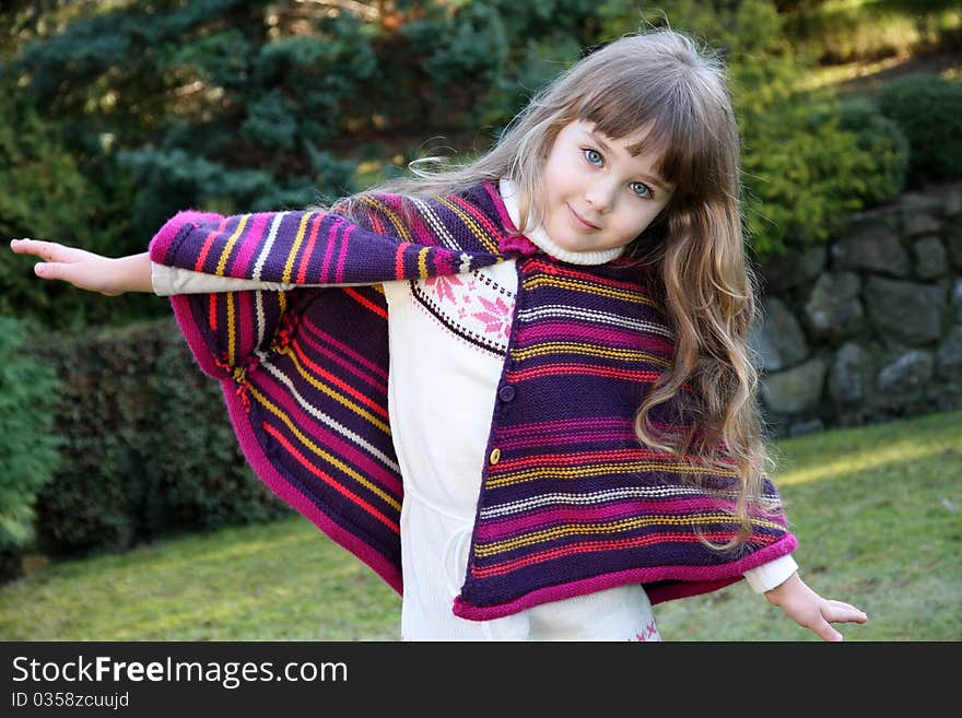 Beautiful little portrait of girl in park